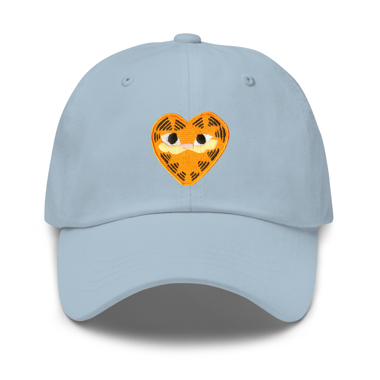 A baby blue unisex dad hat featuring a heart-shaped orange patch depicting Garfield the cat.