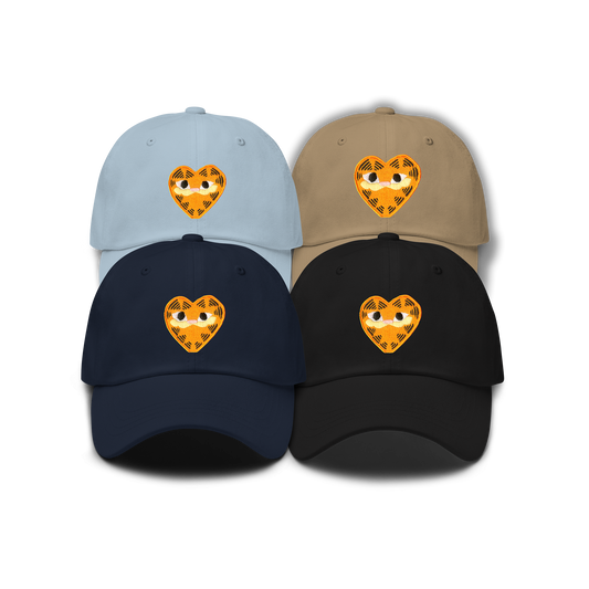 Four dad hats with orange heart shaped patches depicting Garfield the Cat.