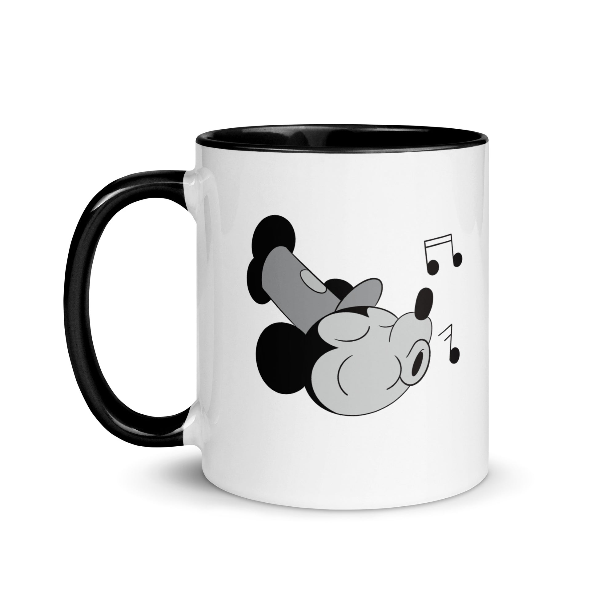 A white coffee mug with black and white images of Mickey and Minnie Mouse.